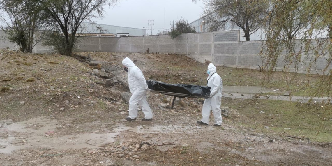 Encuentran a un muerto en un arroyo