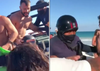 Detienen a pareja gay por besarse en la playa